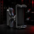 VaultGrip magnetic phone mount hero product shot on gym floor with red rim lighting